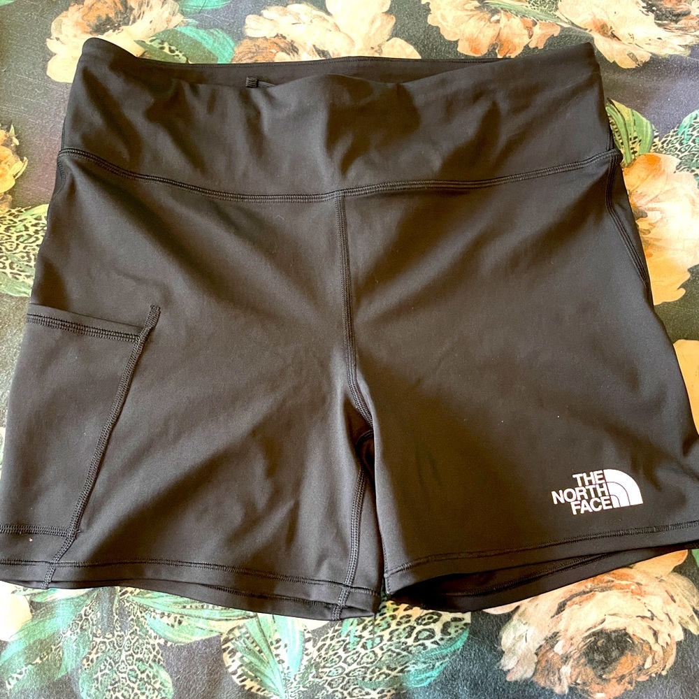 The North Face bike shorts. Never worn/new. Size XL.